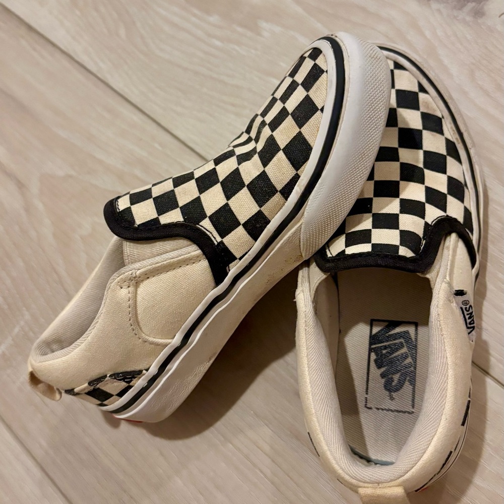 Vans Black and White Checkerboard Slip-On Sneakers